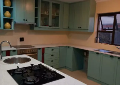 Duck-egg blue fitted kitchen cabinetry
